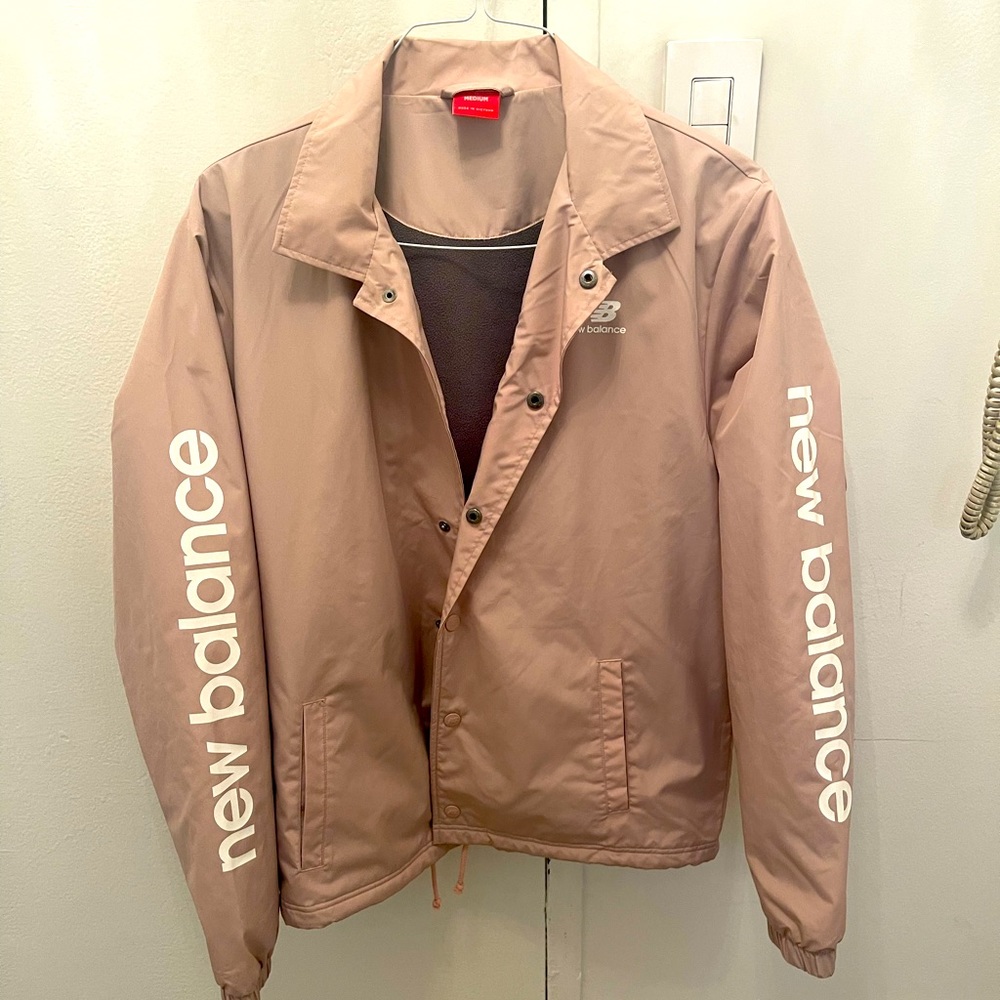 Never worn new balance wind breaker